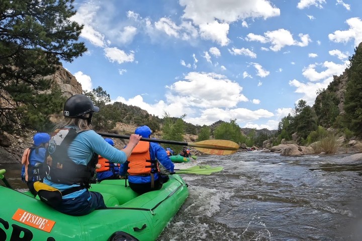 a man riding a motorcycle on a raft